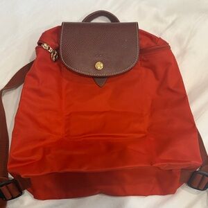 Orange longchamps Le pliage backpack